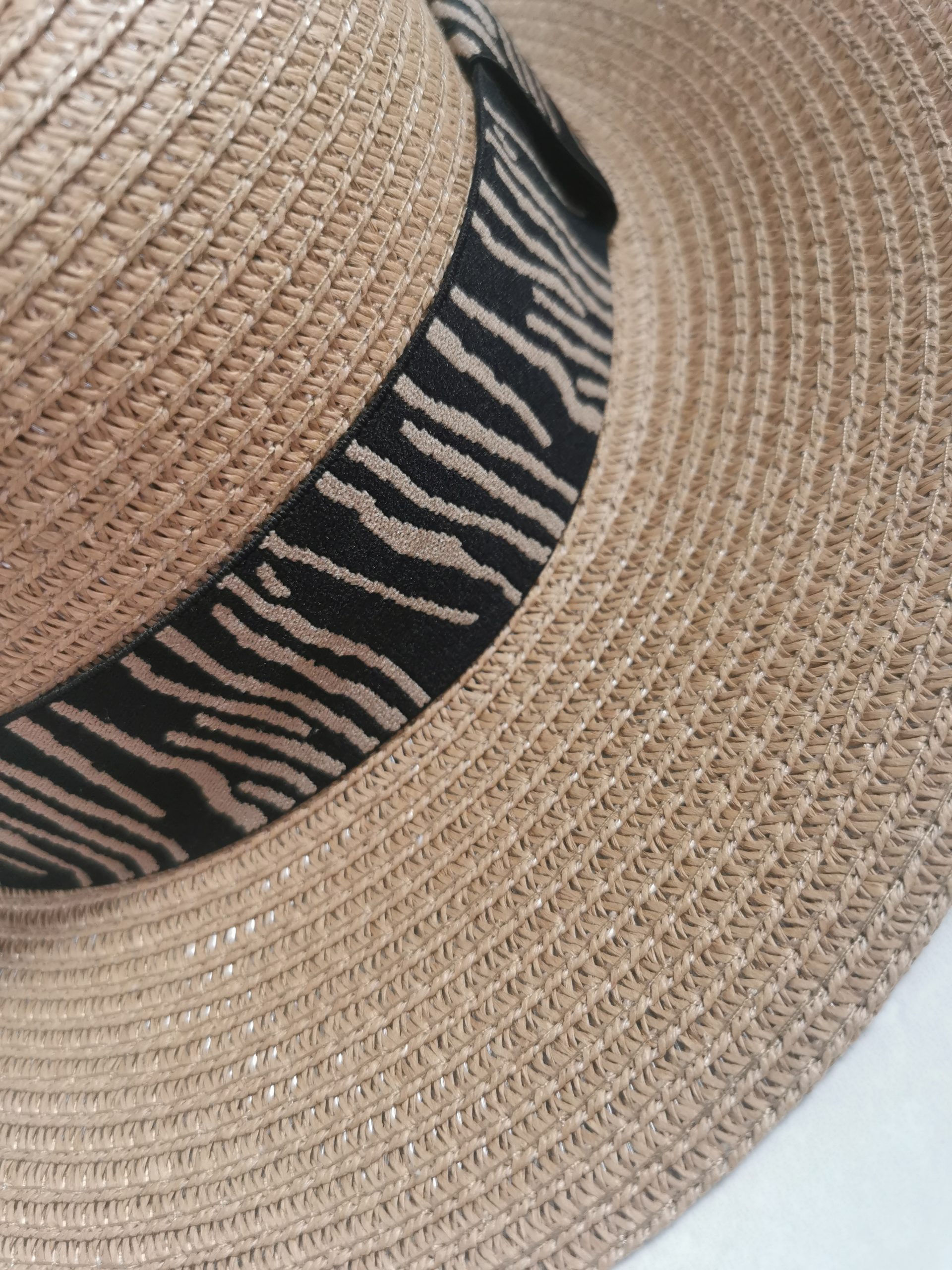 tan boater with animal print trim